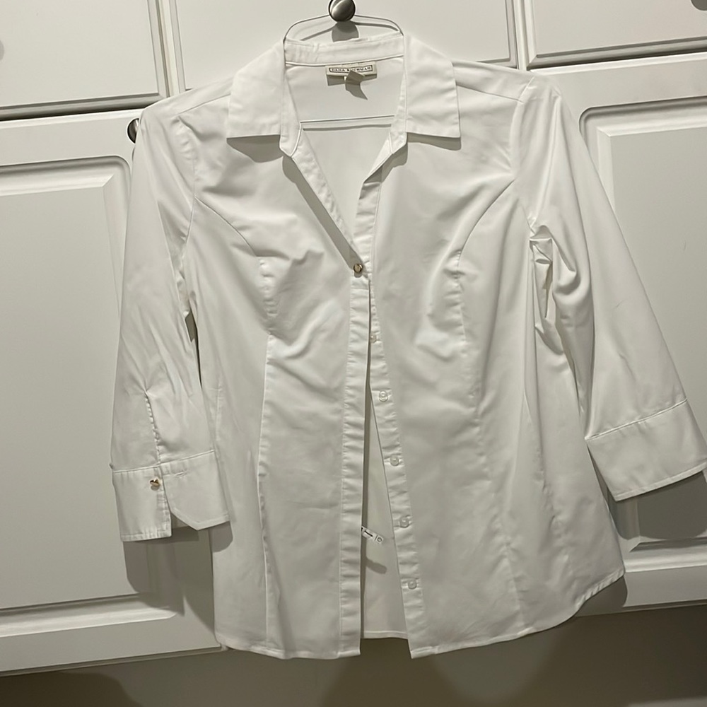 Women’s medium button-down shirt with gold buttons on cuffs and on neckline.